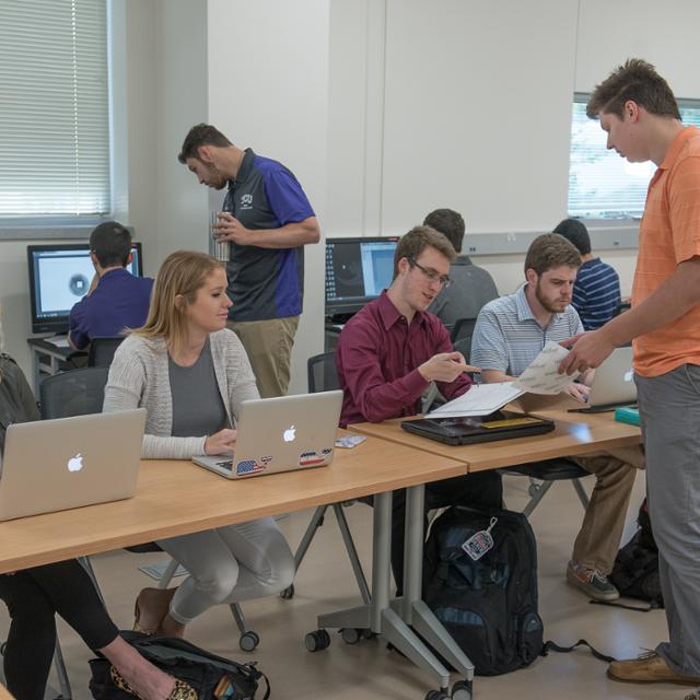 senior design team working in a classroom