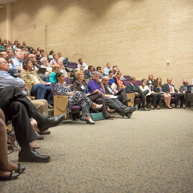 student presenting in front of an audience